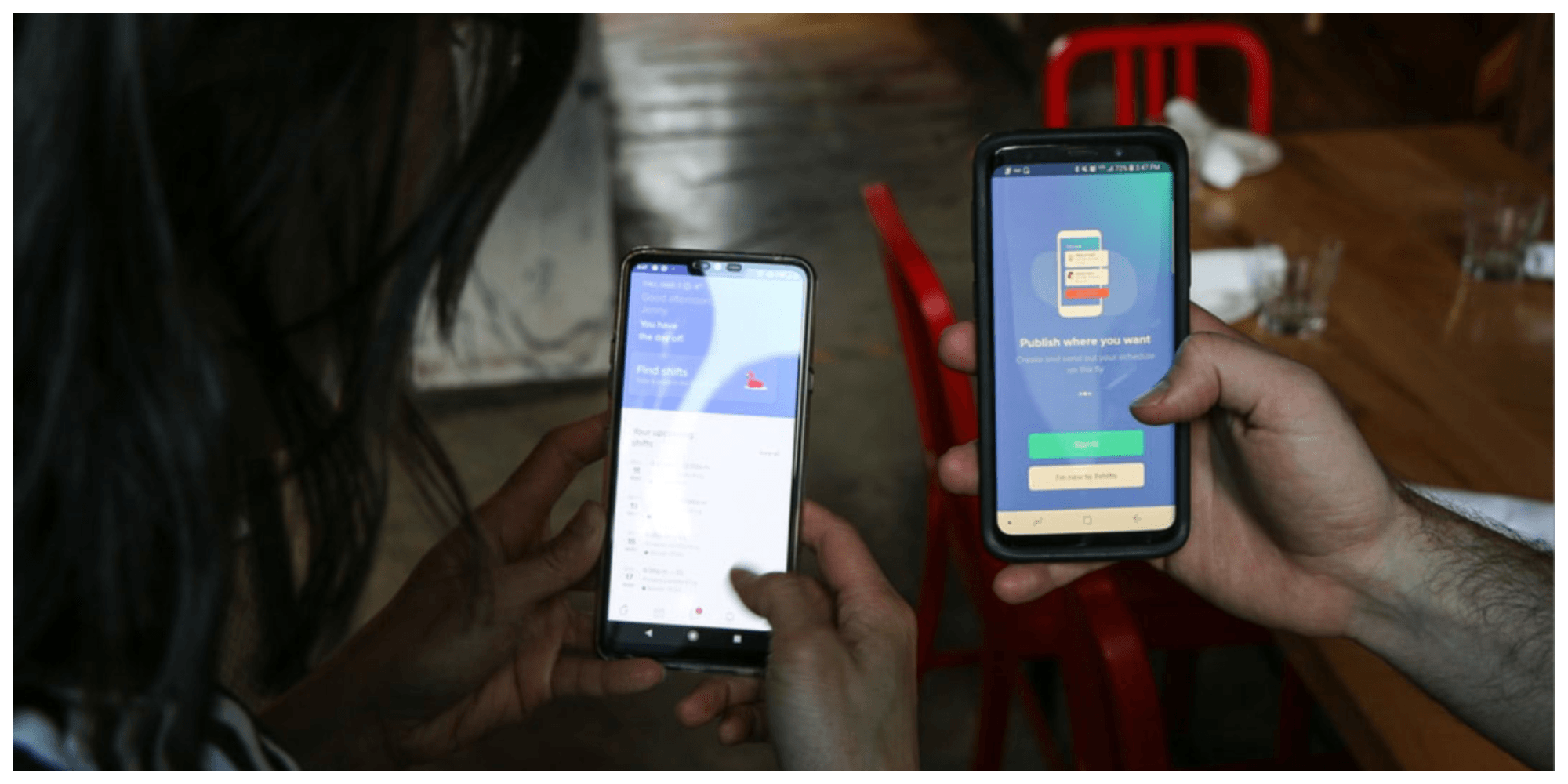 two hands holding phones with screens showing